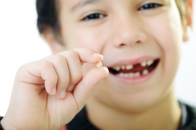 kids broken tooth from injury